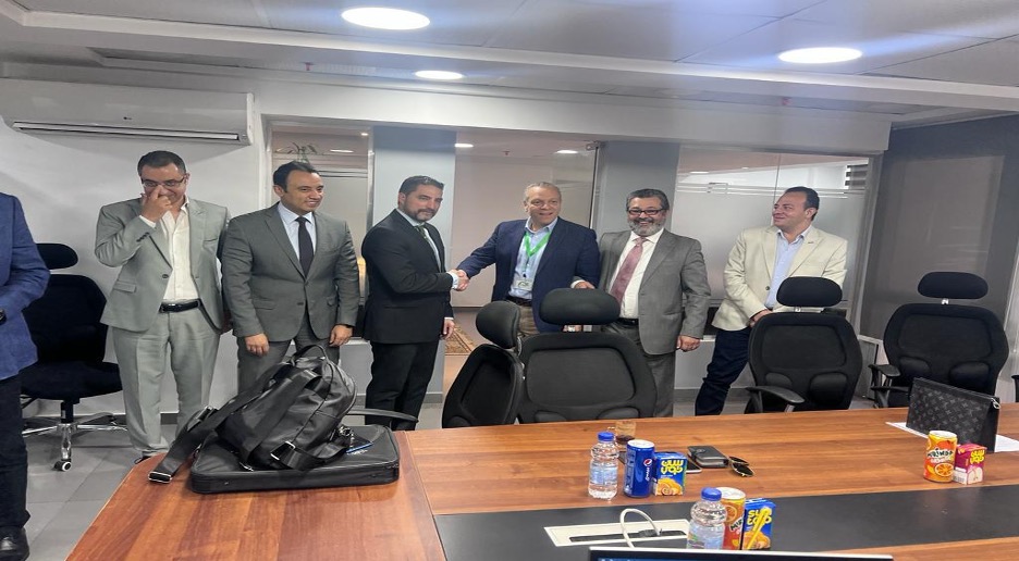 Closing handshake on Egyptian distribution agreement